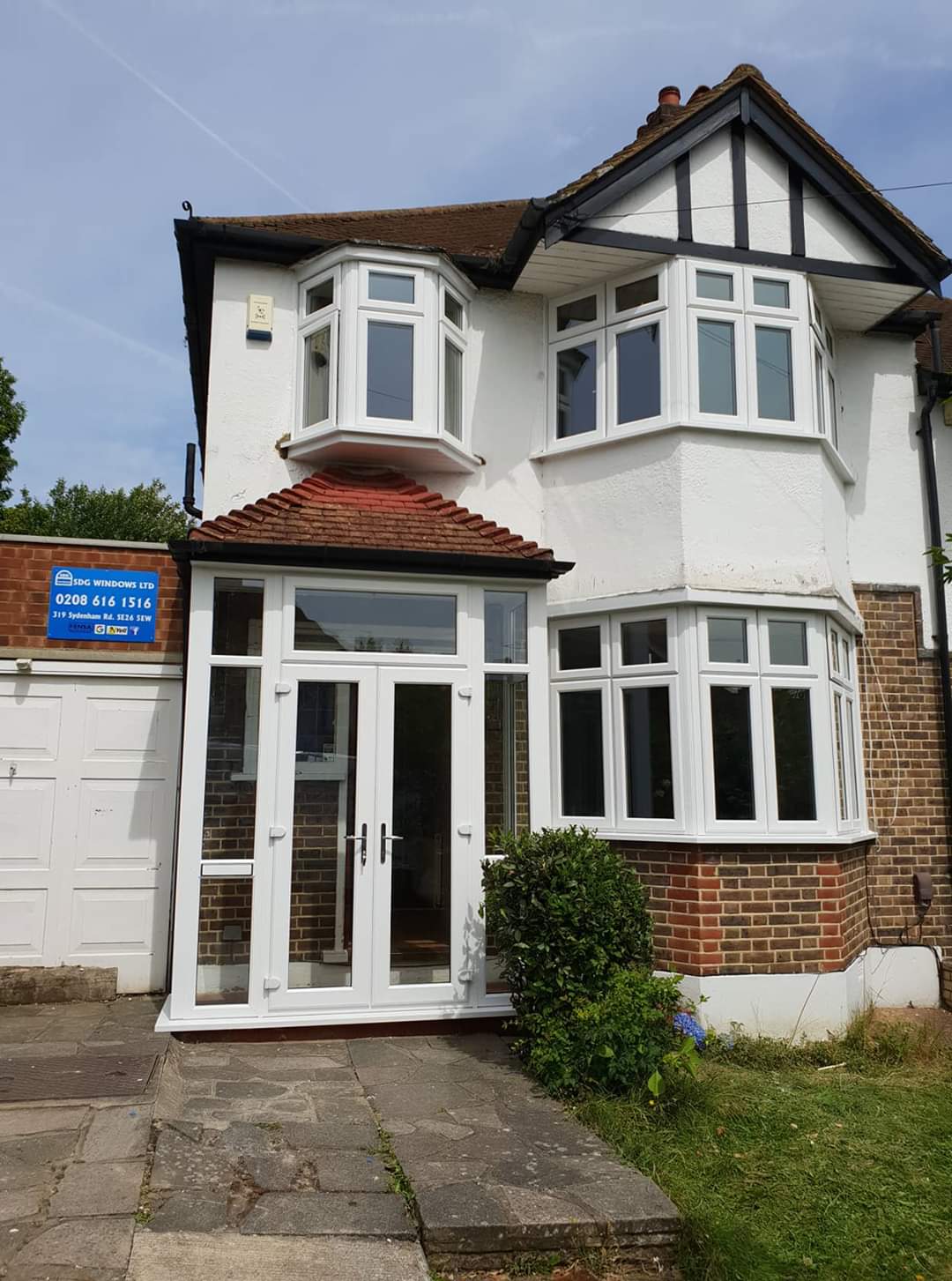 Bay window installation on a London facade